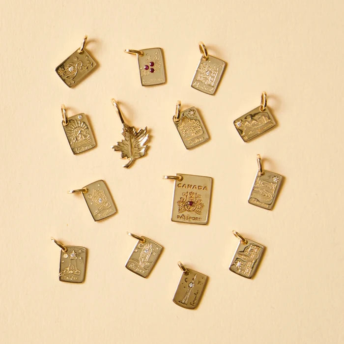 Toronto Postcard Charm in 10k yellow gold with brilliant diamond, studio detail view