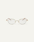 Face shot of Bonnie Clyde Heirloom optical frames in gold and dark brown with clear lenses.
