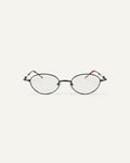 Face shot of Bonnie Clyde Heirloom optical frames in black and tortoise with clear lenses.