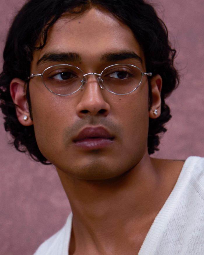 Quarter shot of Bonnie Clyde Heirloom optical frames in silver and tortoise with clear lenses.