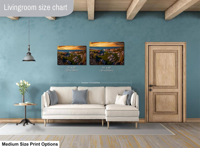 a living room with a white sofa, a wooden door, and a painting of a cityscape on the wall. The living room appears to be well-lit and decorated with various elements, such as a potted plant and a vase.