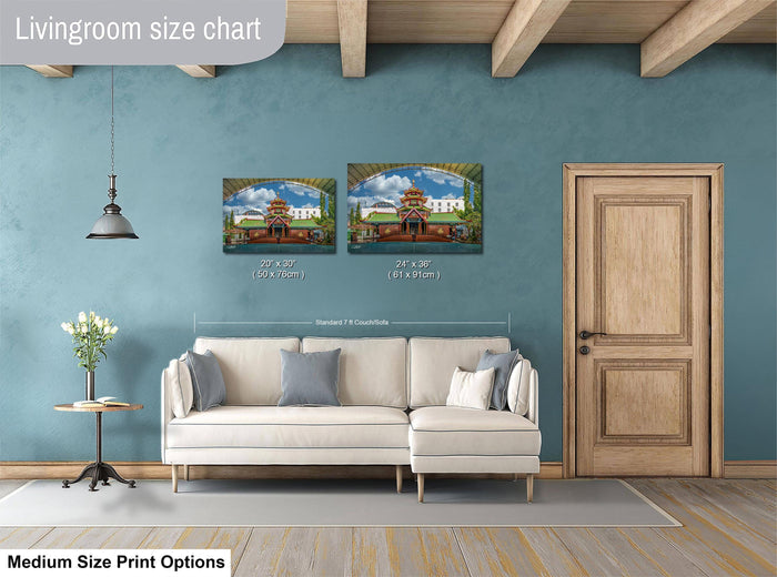 a living room with a white sofa, a wooden door, and a painting of a building on the wall. The painting is of a temple with a pagoda roof. The living room has a blue wall and a wooden floor.