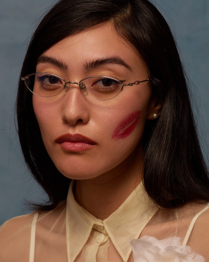 Quarter shot of Bonnie Clyde Jewel optical frames in silver with clear lenses.