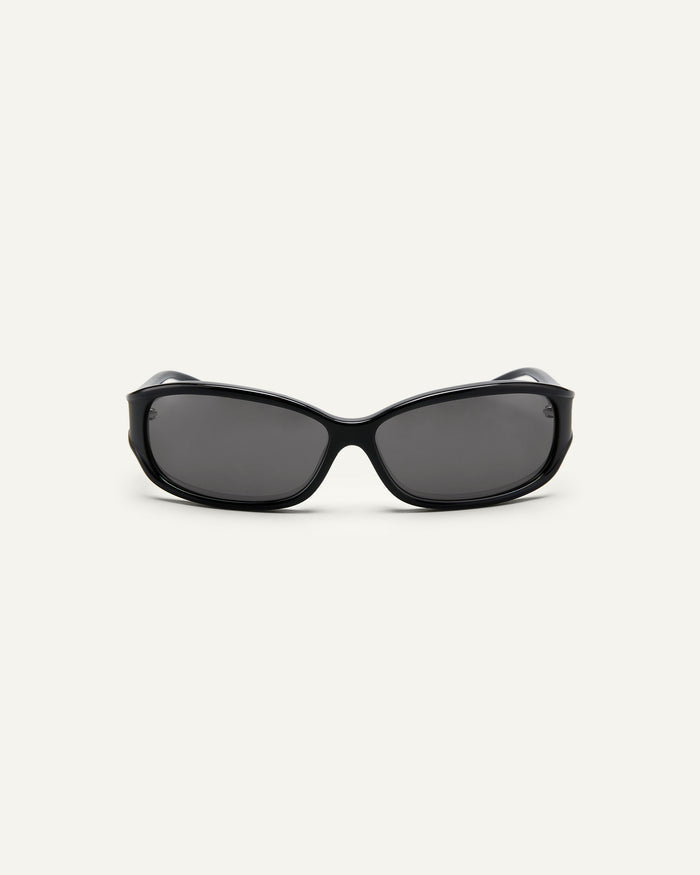 Face shot of Bonnie Clyde Joans sunglasses in black with black lenses.