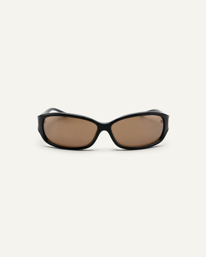 Face shot of Bonnie Clyde Joans sunglasses in black with brown lenses.