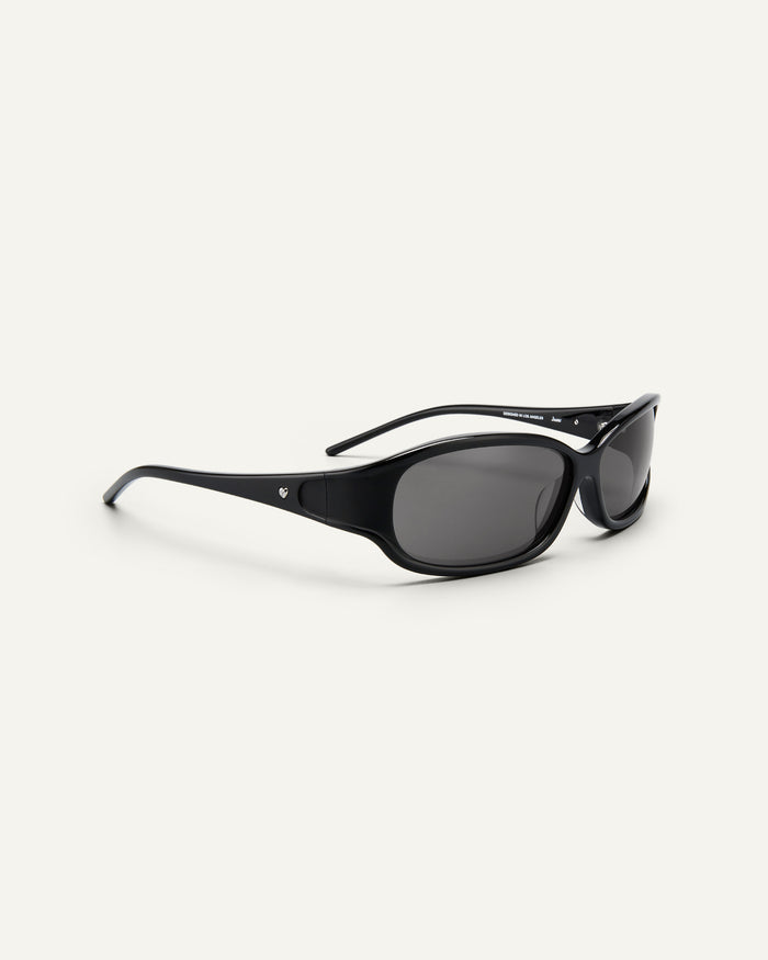 Side shot of Bonnie Clyde Joans sunglasses in black with black lenses.