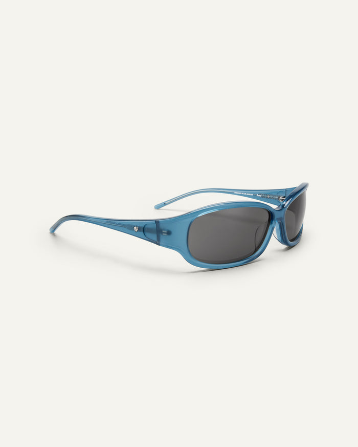 Quarter shot of Bonnie Clyde Joans sunglasses in blue and black.