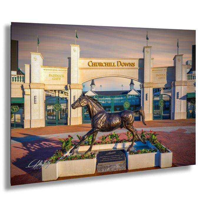 Churchill Downs paddock art, Aristides Kentucky Derby photo, historic racetrack sunset, Louisville horse racing decor, iconic horse statue print, Kentucky Derby beginnings, equestrian legacy wall art, thoroughbred champion tribute, paddock gates Churchill Downs, first Derby winner image, sunset equine photograph, legendary Louisville landmark, horse lover gift idea, timeless racehorse print, Churchill Downs fine art
