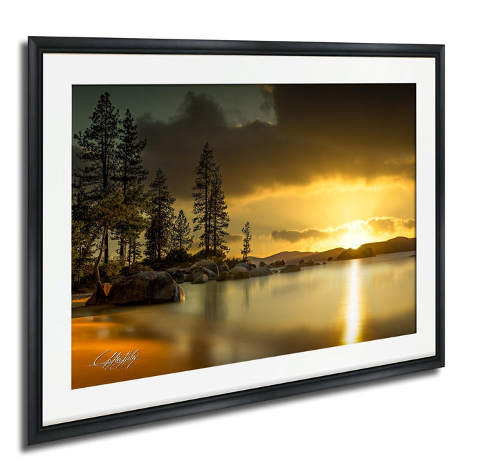 a serene landscape with a lake, trees, and a sunset over the horizon.