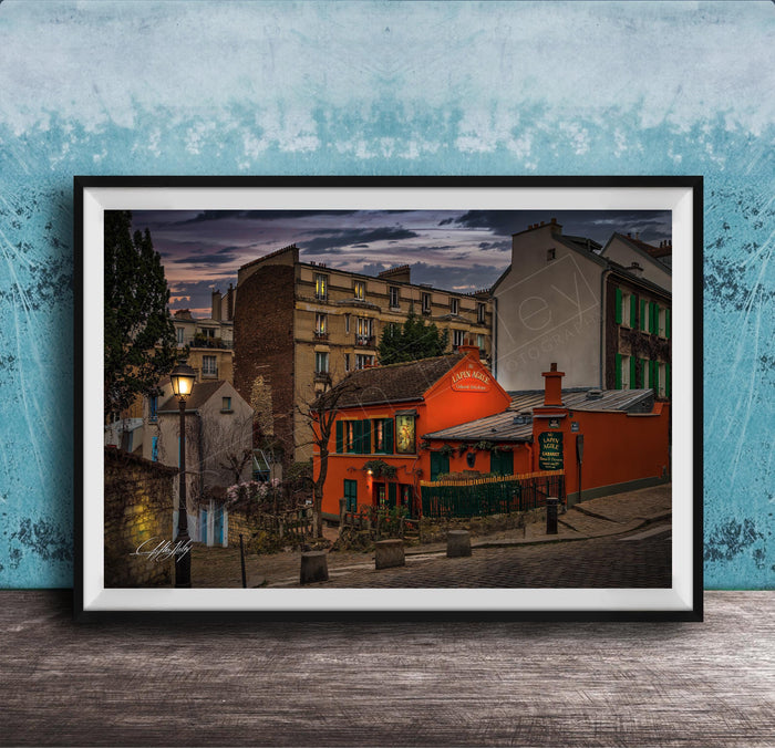 a charming street scene in a European city, with colorful buildings, a red building with a green awning, and a lamppost in the foreground.