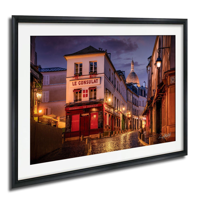 a charming street scene in Paris, France, with a variety of colorful buildings, street lamps, and a prominent dome in the background.