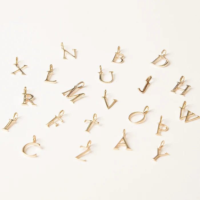 Letter Charm in 10k yellow gold, alternate angle detail view