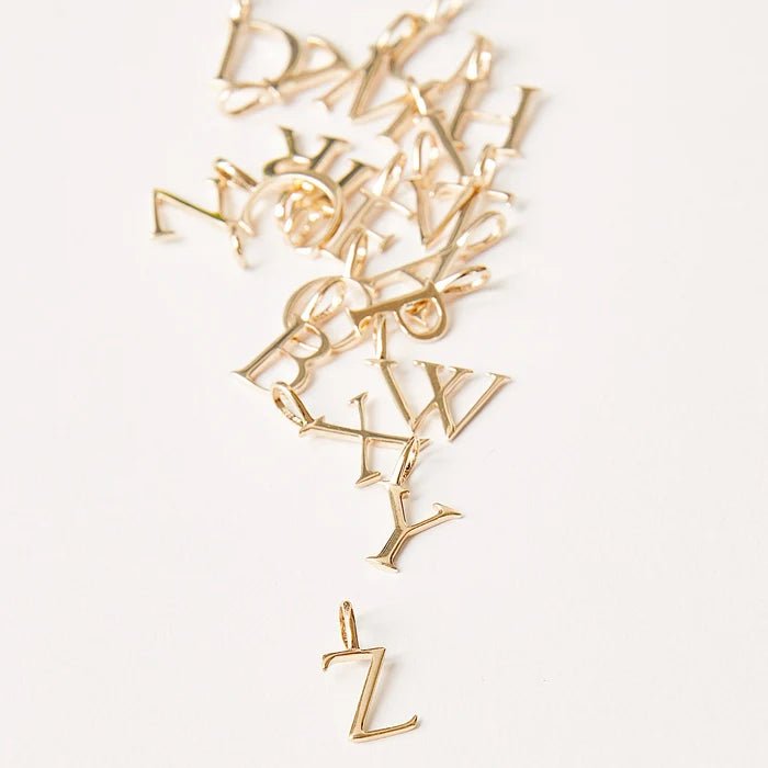 Letter Charm in 10k yellow gold, alternate angle detail view 5
