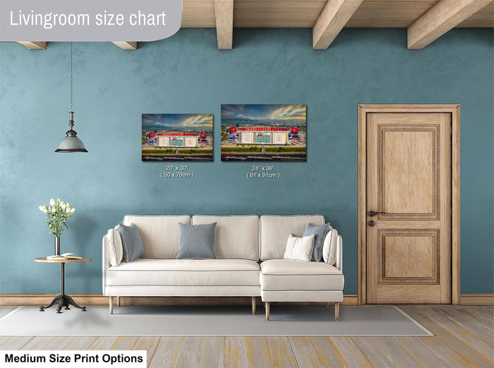 a living room with a white sofa, a wooden door, and a painting of a building on the wall. The painting is of medium size, and the sofa is of medium size as well. The living room appears to be well-decorated with a potted plant and a vase on a table.