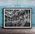 This luxury fine art photograph captures the grand interior architecture of the Library of Congress in Washington DC. Marble columns, ornate ceilings, and classical symmetry create a refined composition rooted in American national history and cultural legacy. Ideal for collectors, professionals, and interior designers seeking museum-quality wall art that embodies intellect, heritage, and timeless elegance.