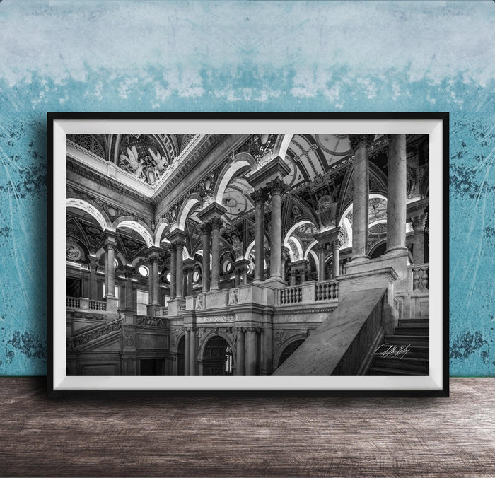 This luxury fine art photograph captures the grand interior architecture of the Library of Congress in Washington DC. Marble columns, ornate ceilings, and classical symmetry create a refined composition rooted in American national history and cultural legacy. Ideal for collectors, professionals, and interior designers seeking museum-quality wall art that embodies intellect, heritage, and timeless elegance.