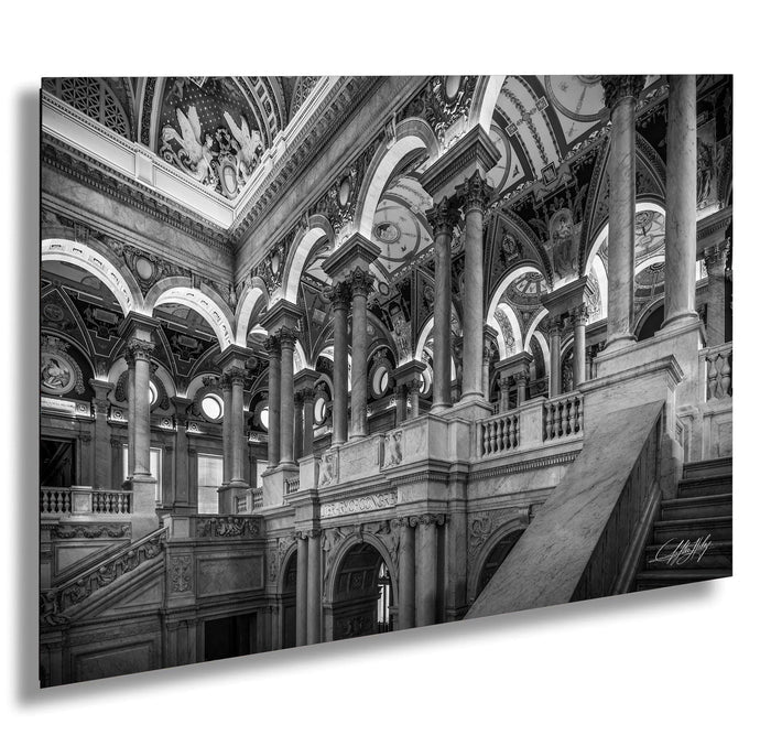 This luxury fine art photograph captures the grand interior architecture of the Library of Congress in Washington DC. Marble columns, ornate ceilings, and classical symmetry create a refined composition rooted in American national history and cultural legacy. Ideal for collectors, professionals, and interior designers seeking museum-quality wall art that embodies intellect, heritage, and timeless elegance.