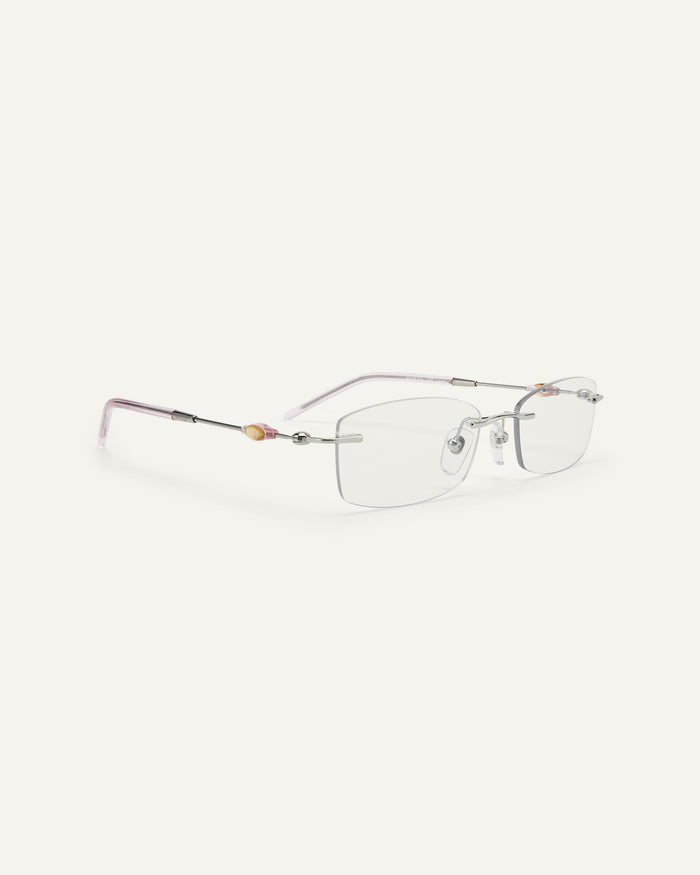 Quarter shot of Bonnie Clyde Lisp optical frames in pink.