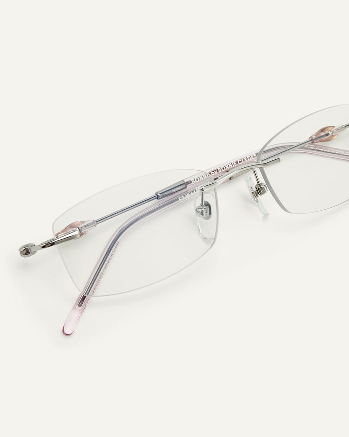 Side shot of Bonnie Clyde Lisp optical frames in pink.