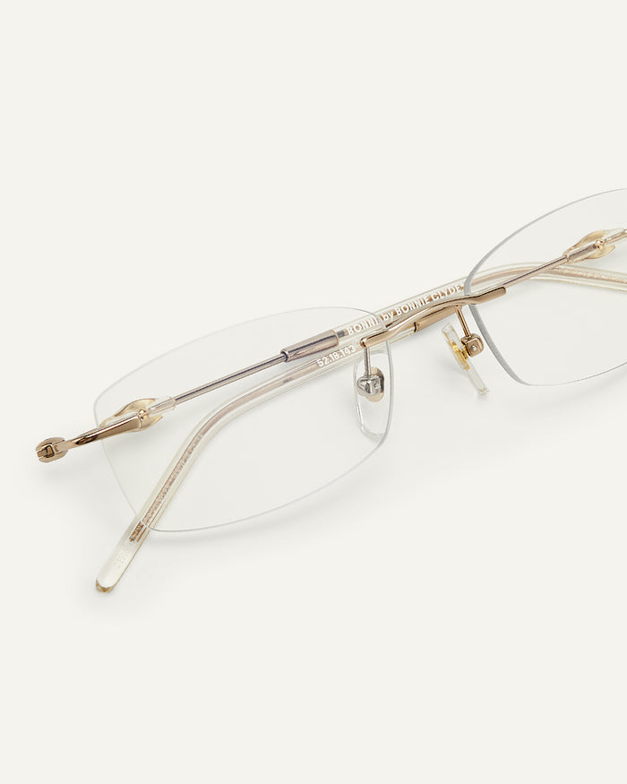 Side shot of Bonnie Clyde Lisp optical frames in transparent yellow.
