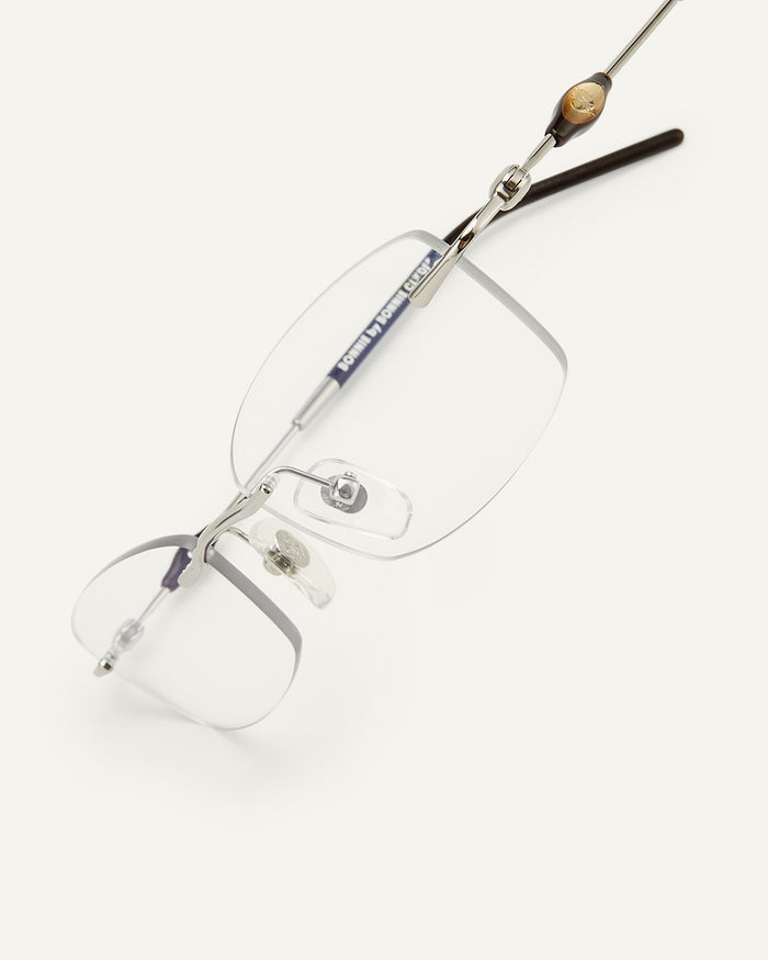 Close-up shot of Bonnie Clyde Lisp optical frames in dark brown.