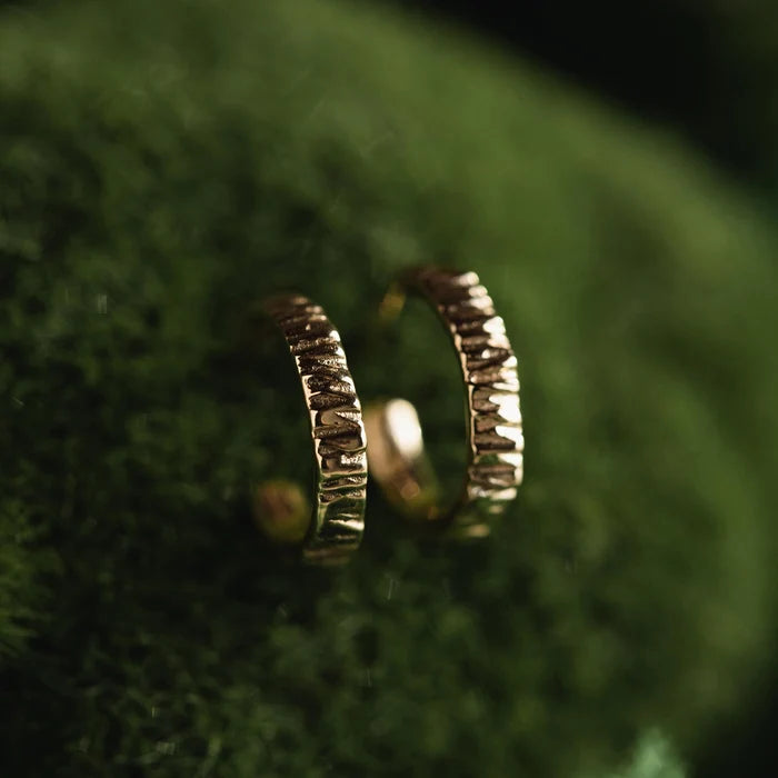 Little Tree Bark Stability Hoop in 14k yellow gold, studio detail view