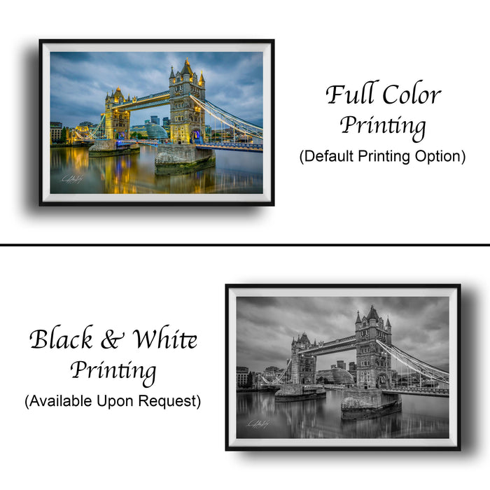 The image is a collage of two framed pictures. The top picture is a full color print of the Tower Bridge in London, while the bottom picture is a black and white print of the same bridge. Both pictures are framed and available upon request.