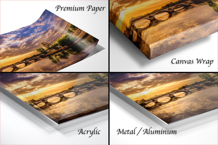 The image is a collage of four different images, each depicting a sunset over a bridge. The images are labeled as "Premium Paper", "Canvas Wrap", "Acrylic", and "Metal/Aluminum".