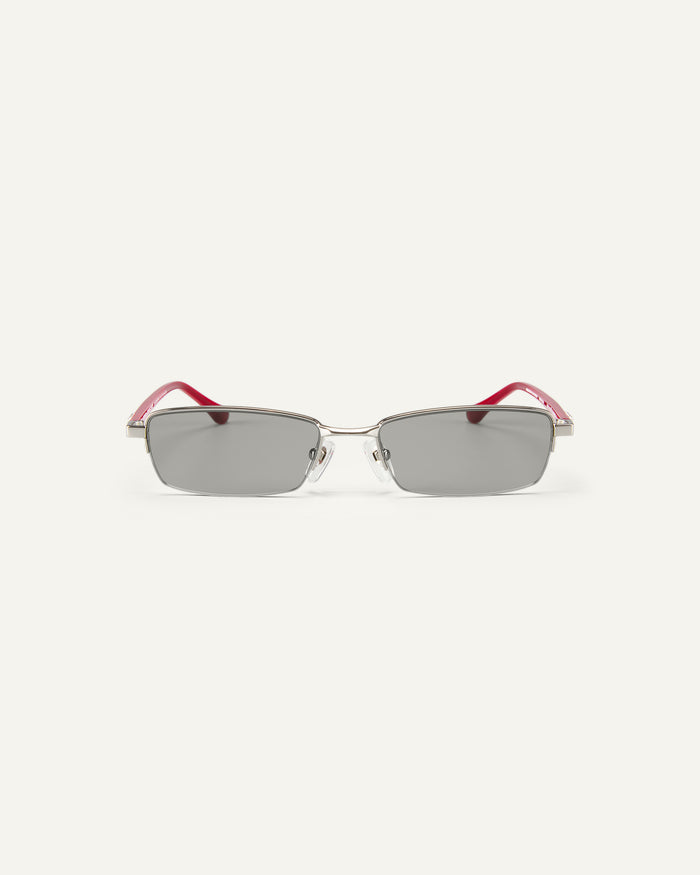 Face shot of Bonnie Clyde Lucky Star sunglasses in silver with grey lenses.