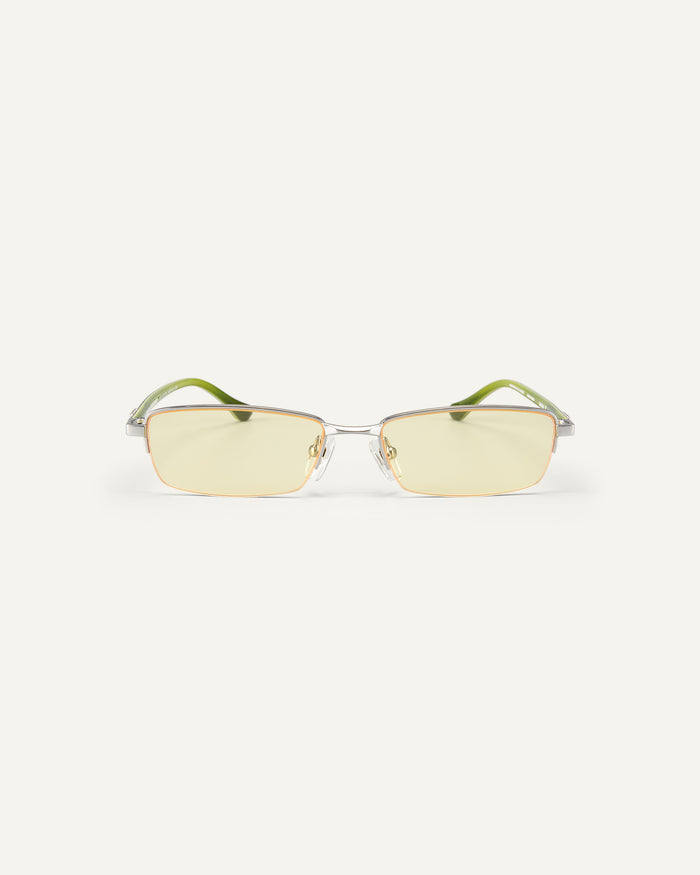 Face shot of Bonnie Clyde Lucky Star sunglasses in silver with yellow lenses.