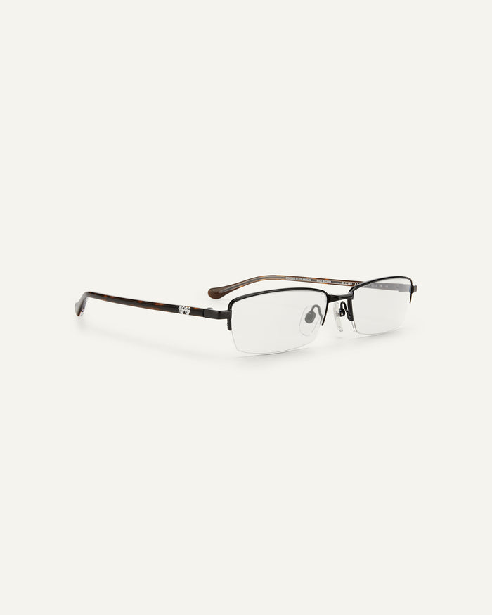 Quarter shot of Bonnie Clyde Lucky Star optical frames in black with clear lenses.