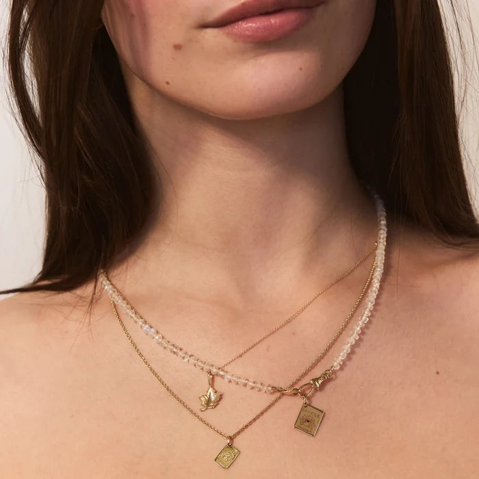 Maple Leaf Charm in 10k yellow gold, alternate angle detail view