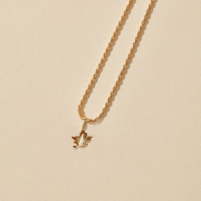 Maple Leaf Charm in 10k yellow gold, alternate angle detail view 2