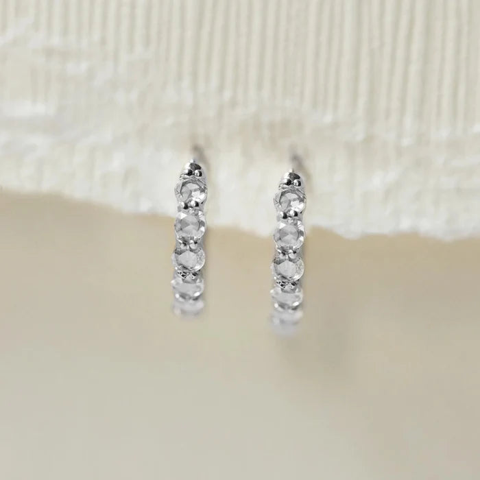 Moonglade Hoops in sterling silver with white sapphire, studio detail view