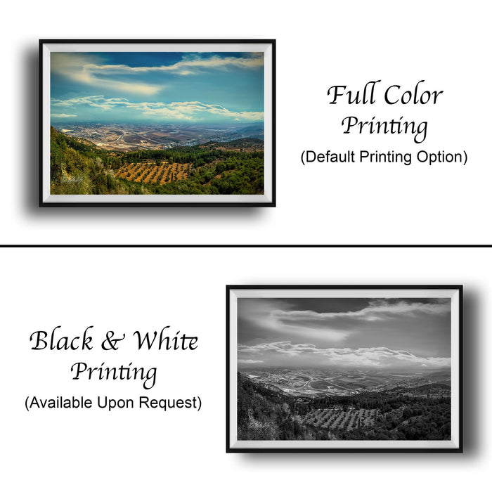 The image is a collage of two framed pictures. The top picture is a full color print of a landscape with a blue sky and clouds, while the bottom picture is a black and white print of the same landscape.