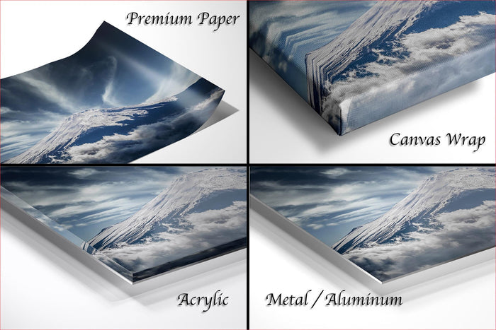 four different views of a mountain landscape, including a close-up of the mountain peak, a close-up of the mountain peak with clouds, a close-up of the mountain peak with clouds, and a close-up of the mountain peak with clouds.