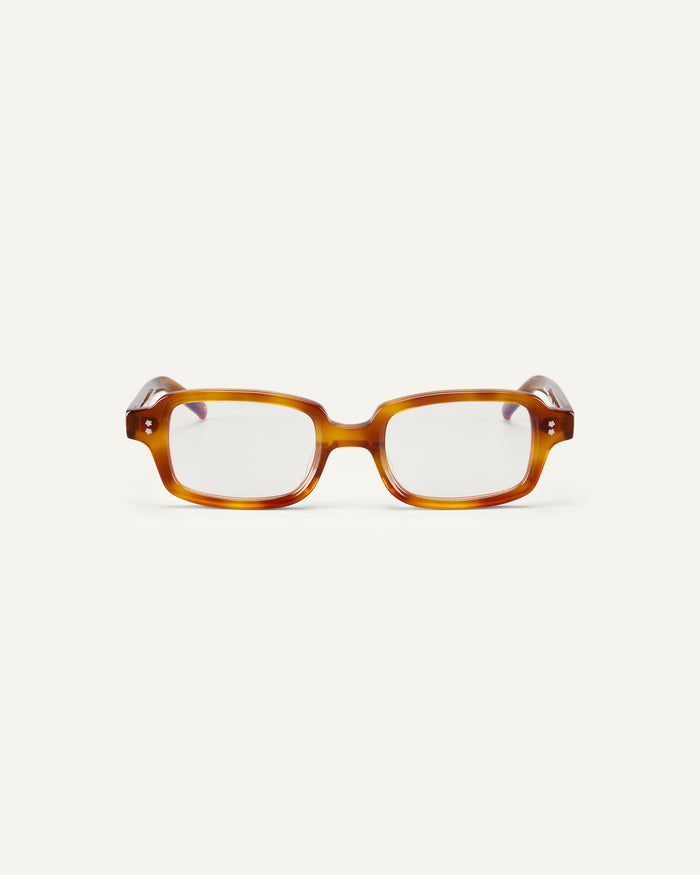 Face shot of Bonnie Clyde Mouse optical frames in yellow tortoise with clear lenses.