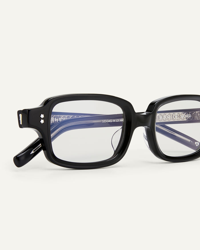 Side shot of Bonnie Clyde Mouse optical frames in black with clear lenses.