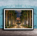 A framed photograph depicting a serene nighttime scene of a palm-lined walkway leading to a building, with the sky illuminated by the warm glow of the setting sun.