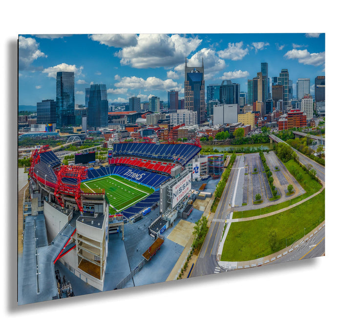 a large football stadium with a city skyline in the background, indicating that it is a professional sports venue.