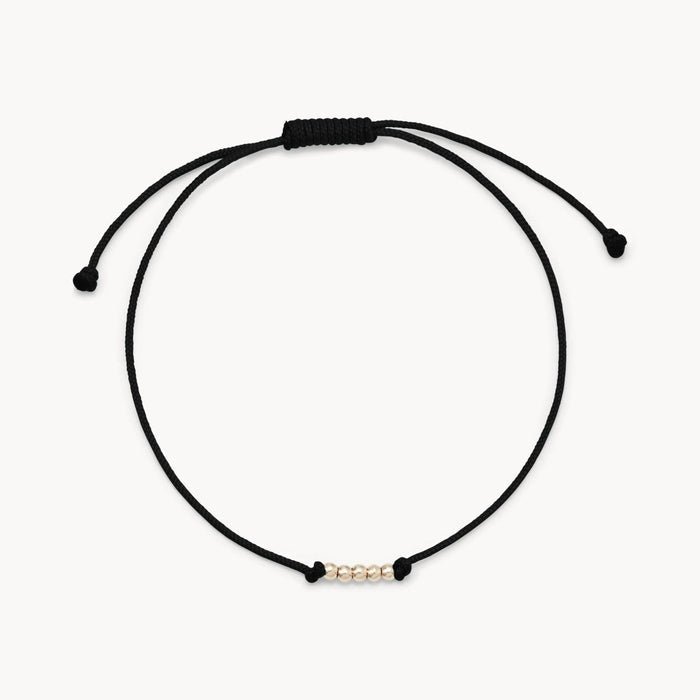 New the Abacus Contemplation Cord Bracelet in 10k yellow gold with black cord
