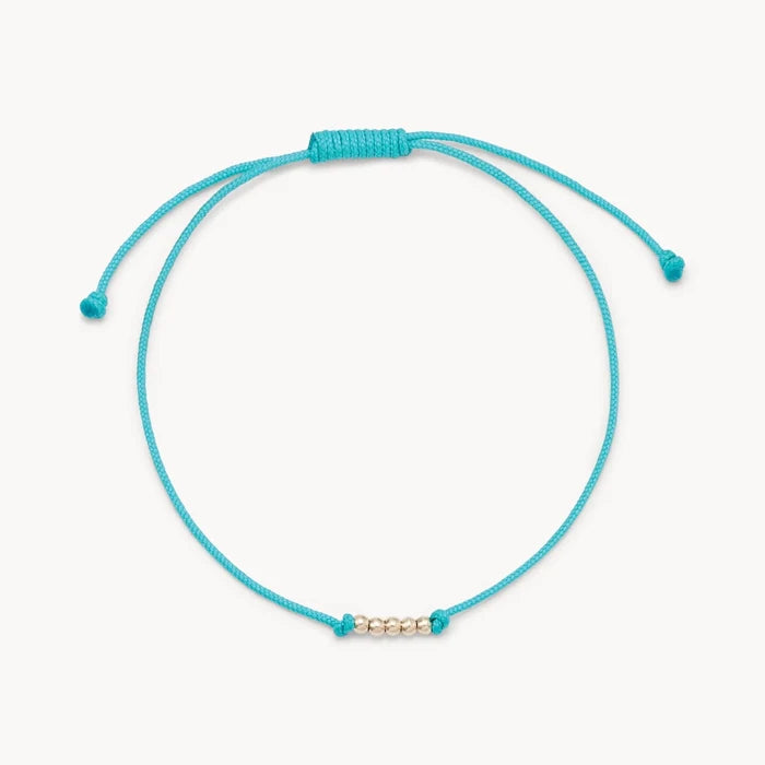 New the Abacus Contemplation Cord Bracelet in 10k yellow gold with teal cord