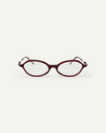 Face shot of Bonnie Clyde Nisa optical frames in black and red tortoise with clear lenses.