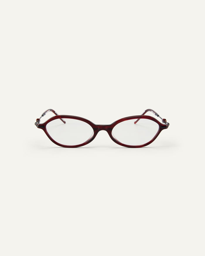 Face shot of Bonnie Clyde Nisa optical frames in black and red tortoise with clear lenses.