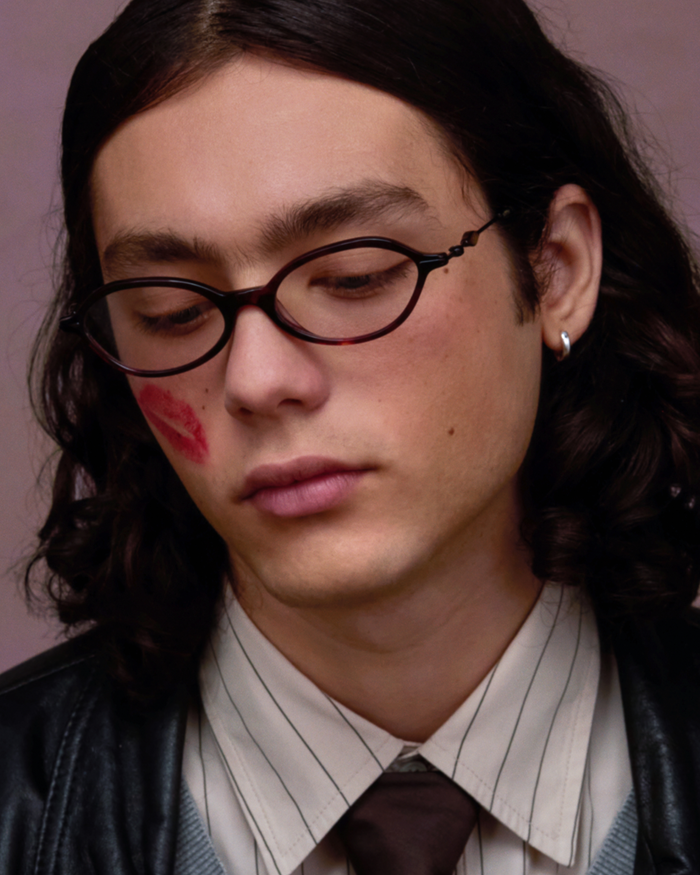 Quarter shot of Bonnie Clyde Nisa optical frames in black and red tortoise with clear lenses.