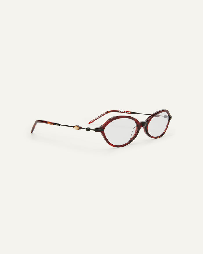 Side shot of Bonnie Clyde Nisa optical frames in black and red tortoise with clear lenses.