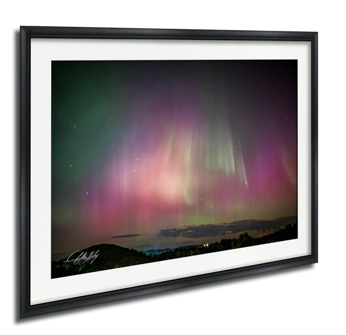 a stunning night sky filled with vibrant colors and patterns, including the mesmerizing aurora borealis or northern lights.
