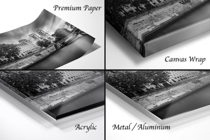 The image is a collage of four different photographs, each depicting a cityscape with buildings and trees. The photographs are labeled as "Premium Paper", "Canvas Wrap", "Acrylic", and "Metal/Aluminum".
