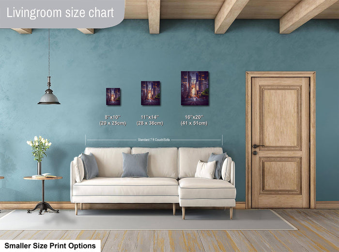 a living room with a white sofa, a wooden door, and a hanging light fixture. There are three framed artworks of different sizes displayed on the wall, and a smaller print option is available for smaller size prints.
