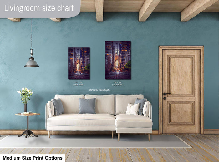 a living room with a white sofa, a wooden door, and a painting of a cityscape hanging on the wall.